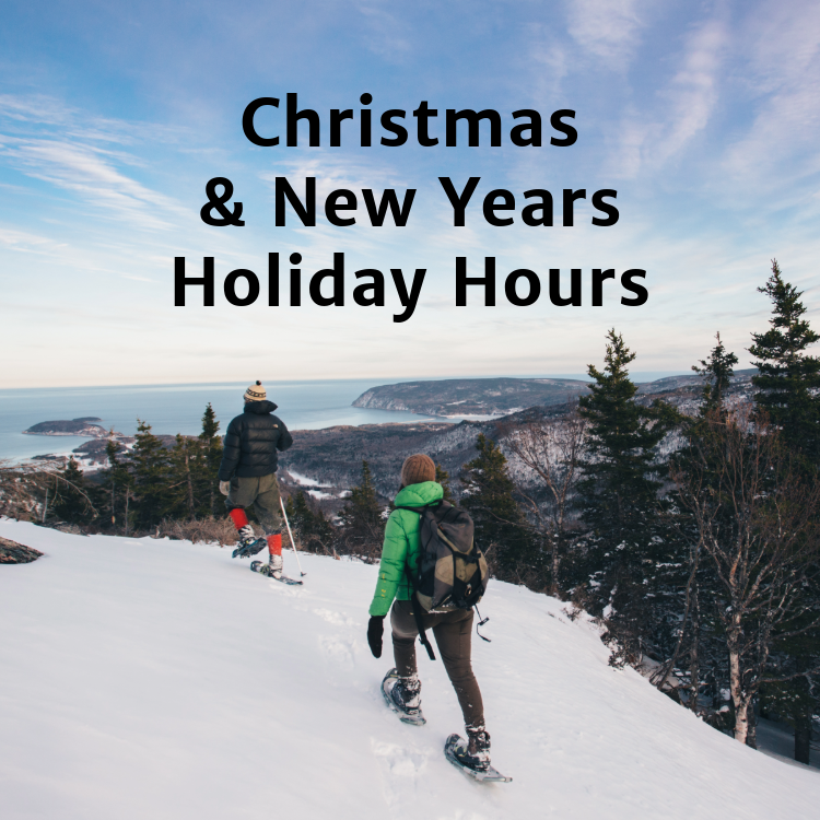 Image of a couple hiking in a winter landscape with snowshoes and text reading "Christmas and New Years Holiday Hours"