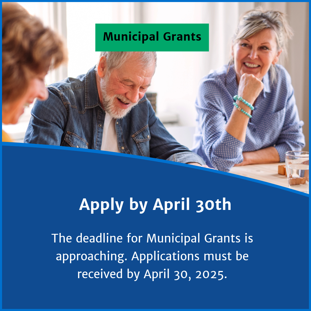 An announcement for Municipal Grants showing an image of three community members smiling at a table together reviewing papers. On the lower half white text on a blue background reads "Apply by April 30th: The deadline for Municipal Grants is approaching. Applications must be received by April 30th, 2025"